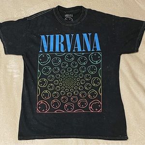 Selling this nice narvana t shirt with rainbow smiley faces